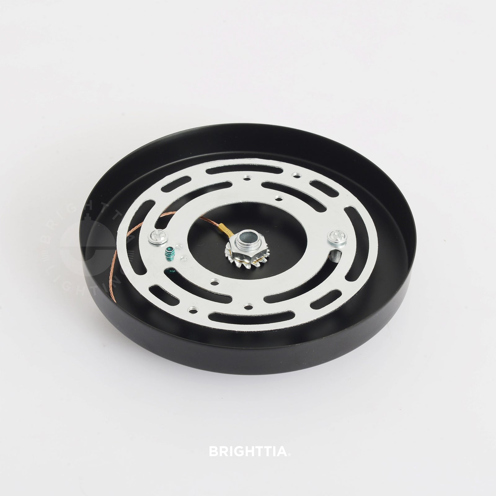 A 5in slim modern 1-port ceiling canopy in black mounted on a white ceiling.