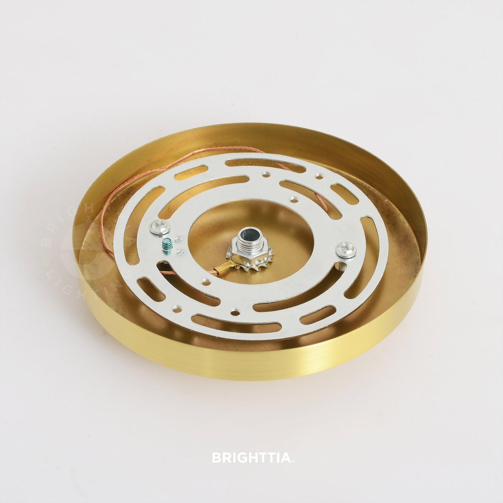 A 5in slim modern 1-port ceiling canopy in brushed gold mounted on a white ceiling.