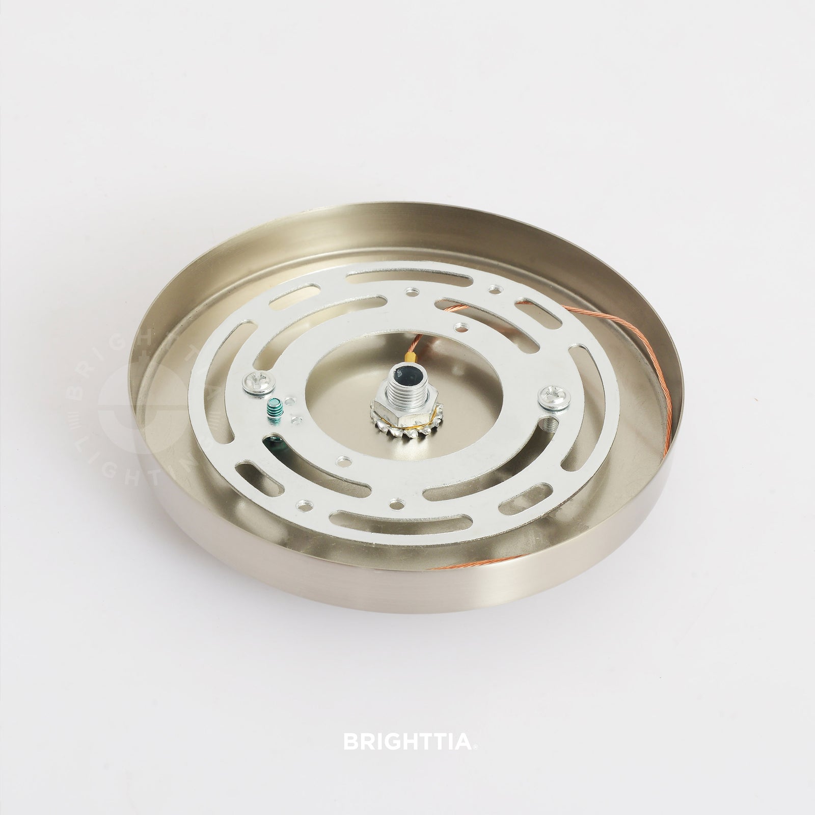 A 5in slim modern 1-port ceiling canopy in brushed nickel mounted on a white ceiling.