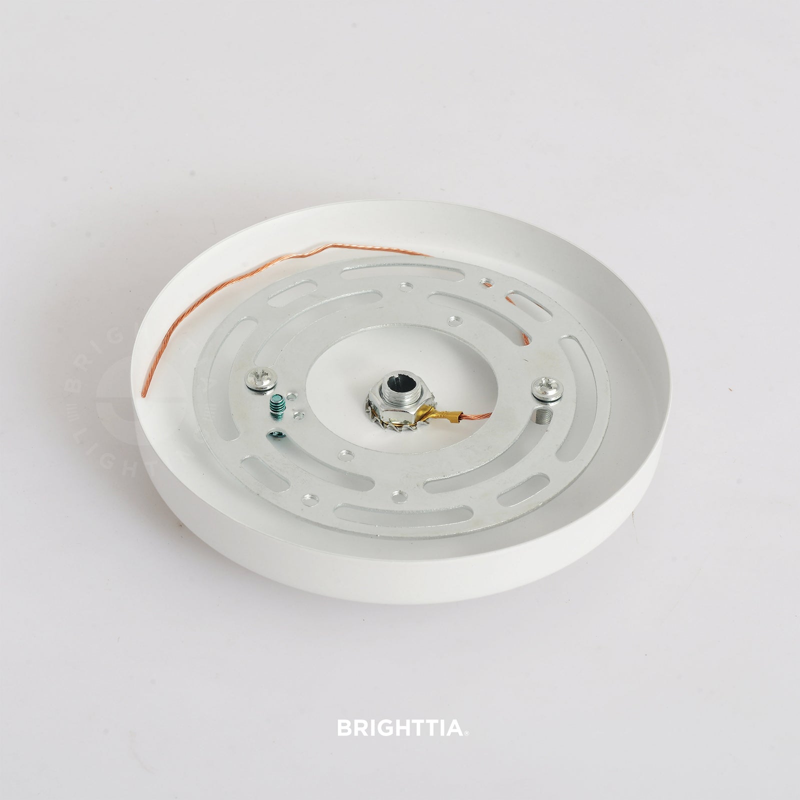 A 5in slim modern 1-port ceiling canopy in white mounted on a white ceiling.