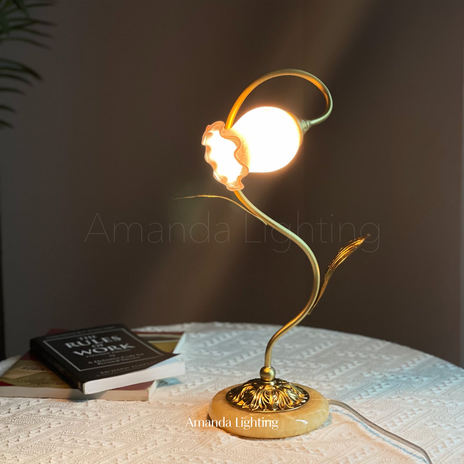 Decorative lamp with pink glass shade 