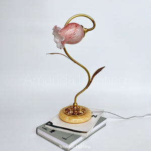 Decorative lamp with pink glass shade 